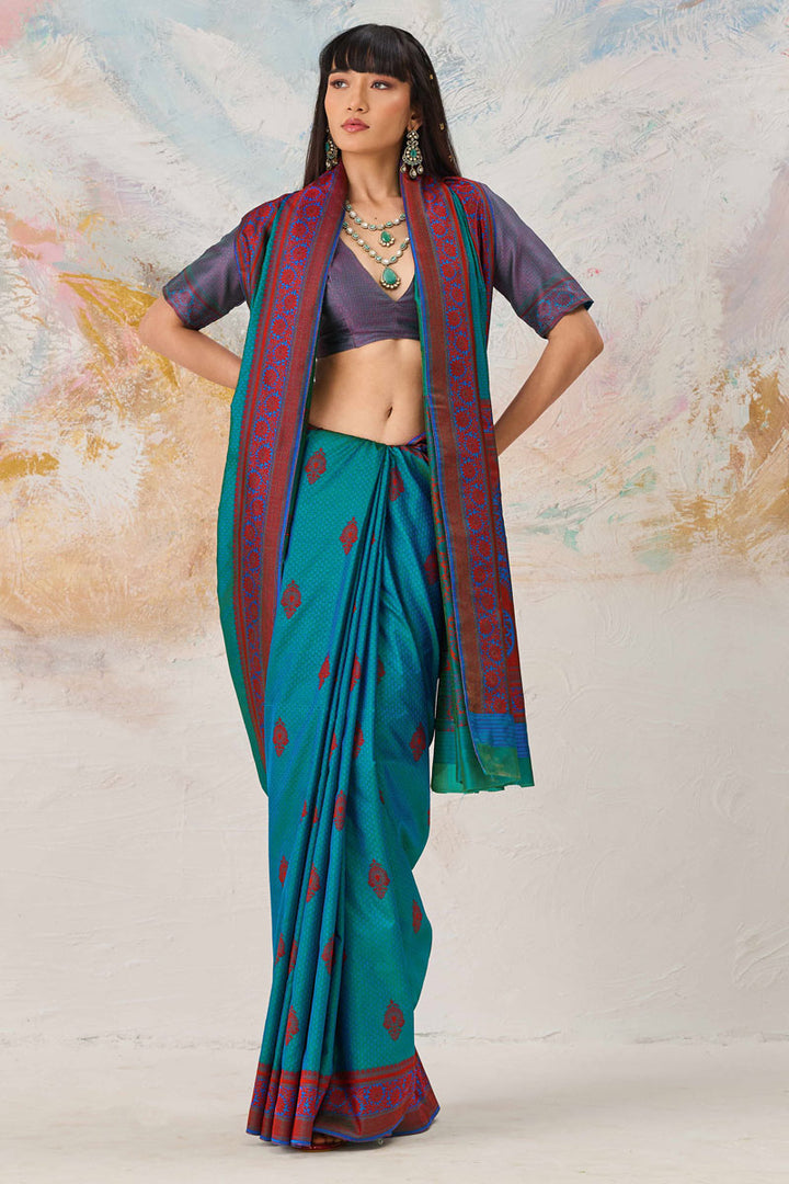 Weaving Work On Teal Color Kanjivaram Silk Saree