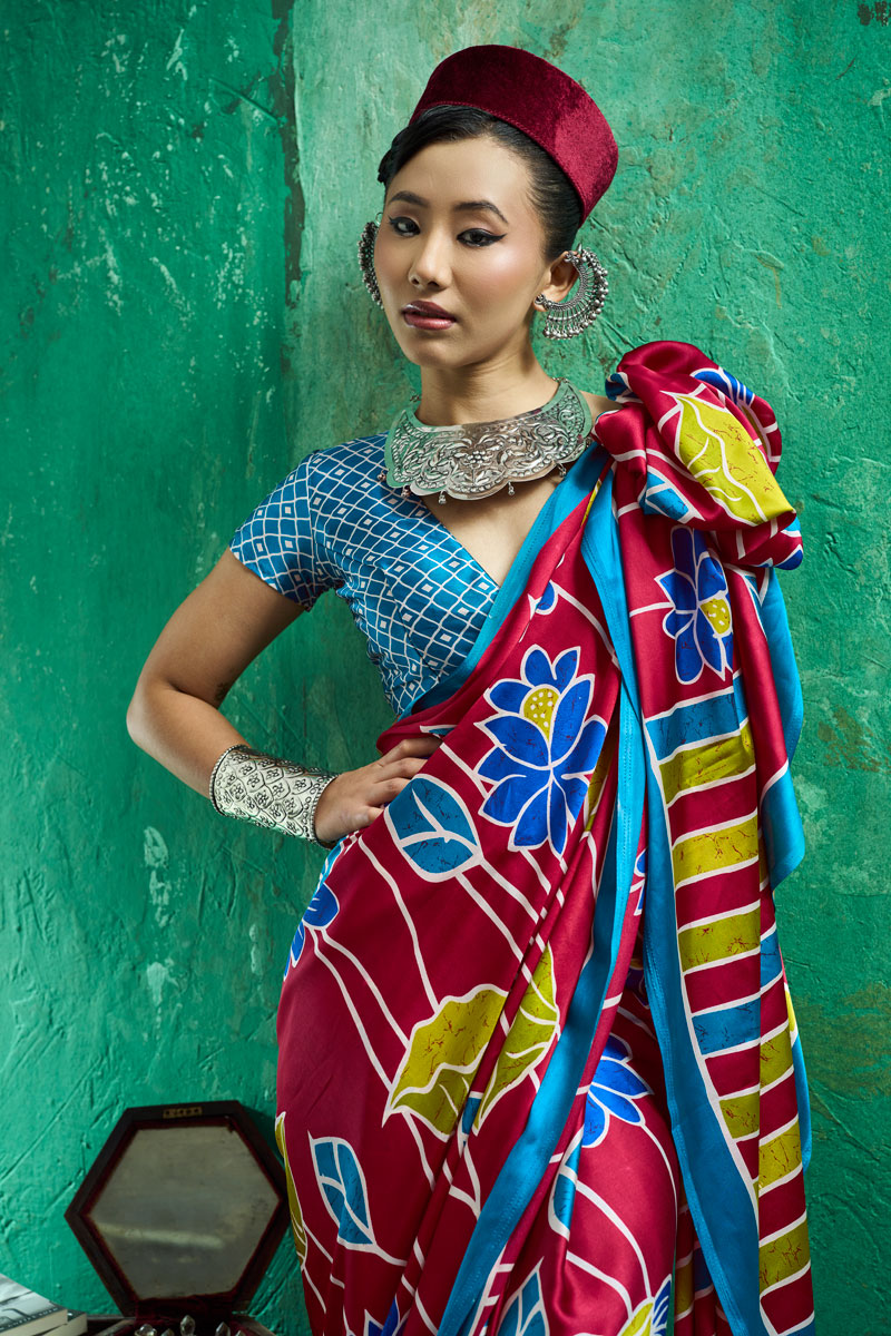 Ajrakh Printed Festive Wear Glamorous Satin Saree In Rani Color