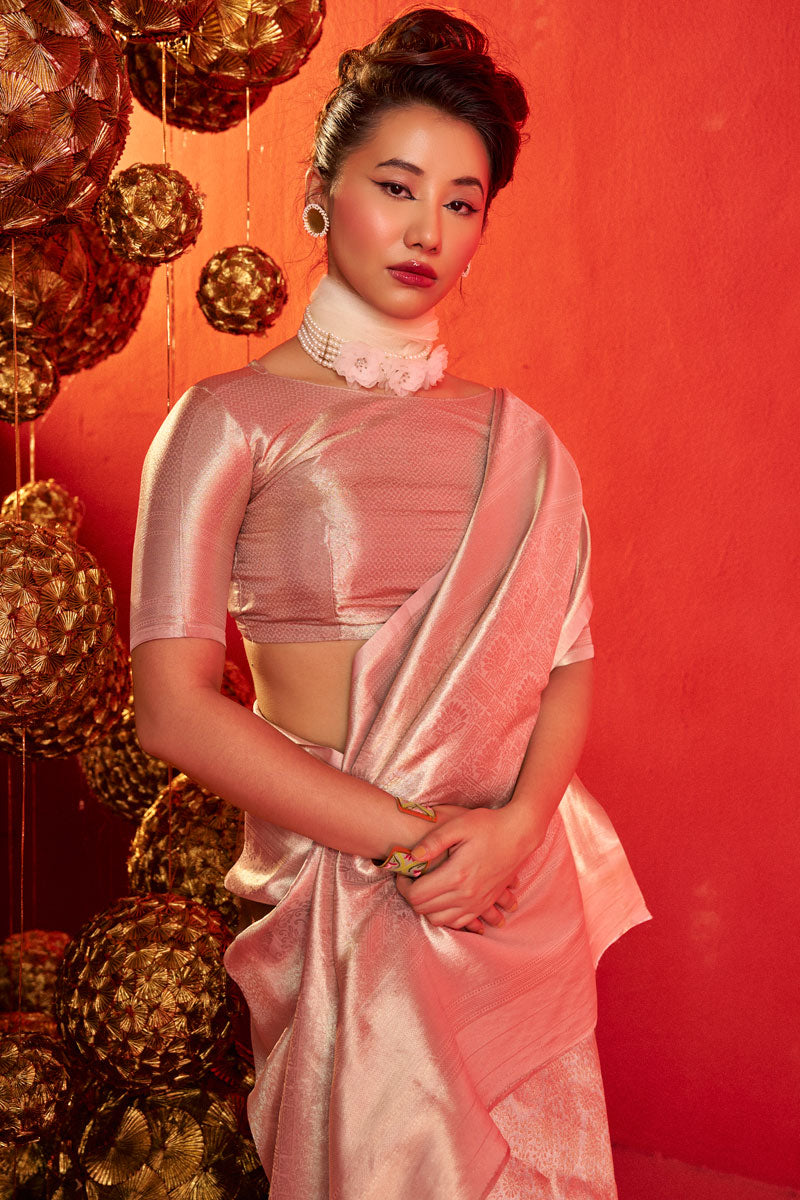 Weaving Work Kanjeepuram Tissue Silk Saree In Peach Color