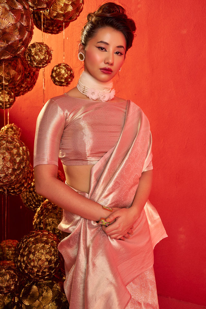 Weaving Work Kanjeepuram Tissue Silk Saree In Peach Color