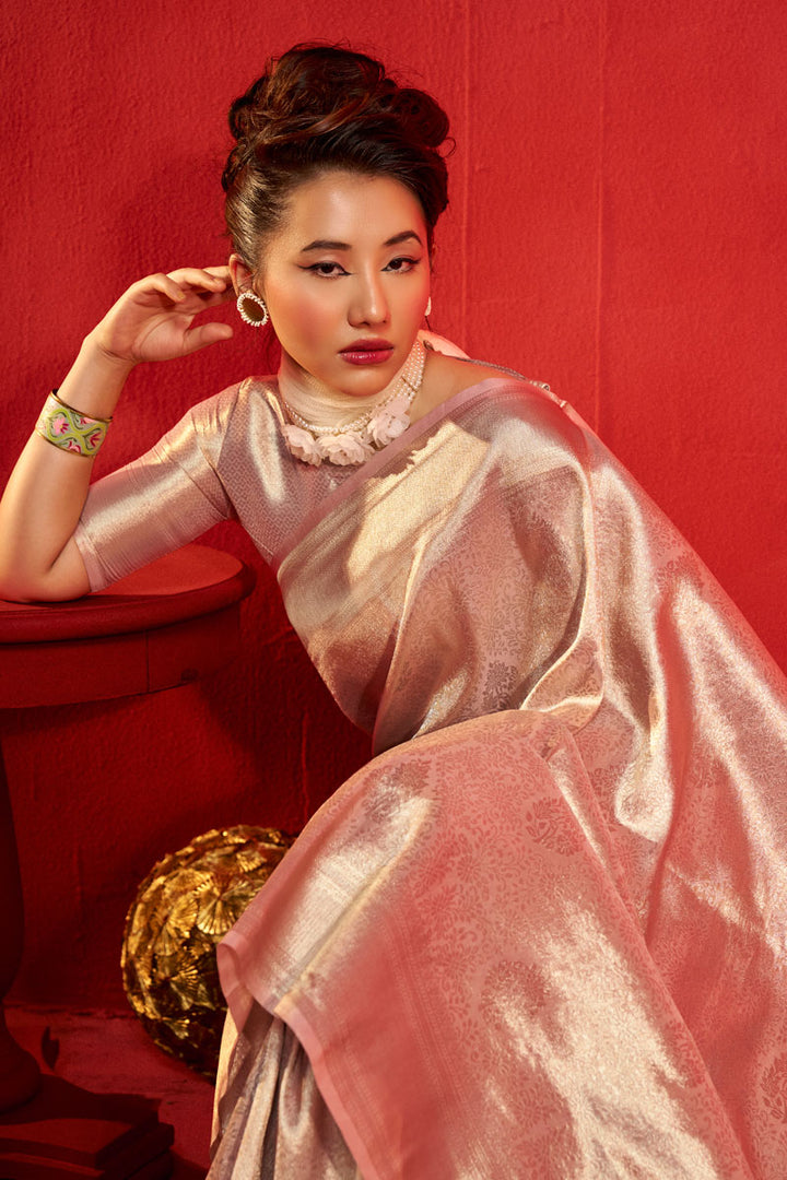 Weaving Work Kanjeepuram Tissue Silk Saree In Peach Color