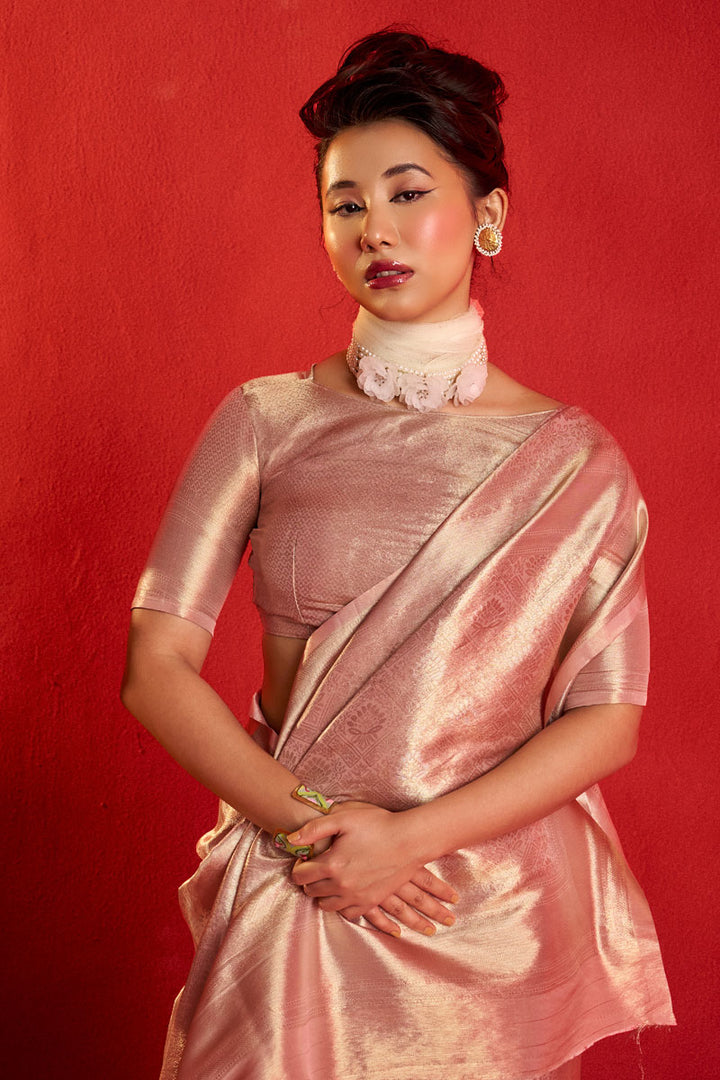 Weaving Work Kanjeepuram Tissue Silk Saree In Peach Color