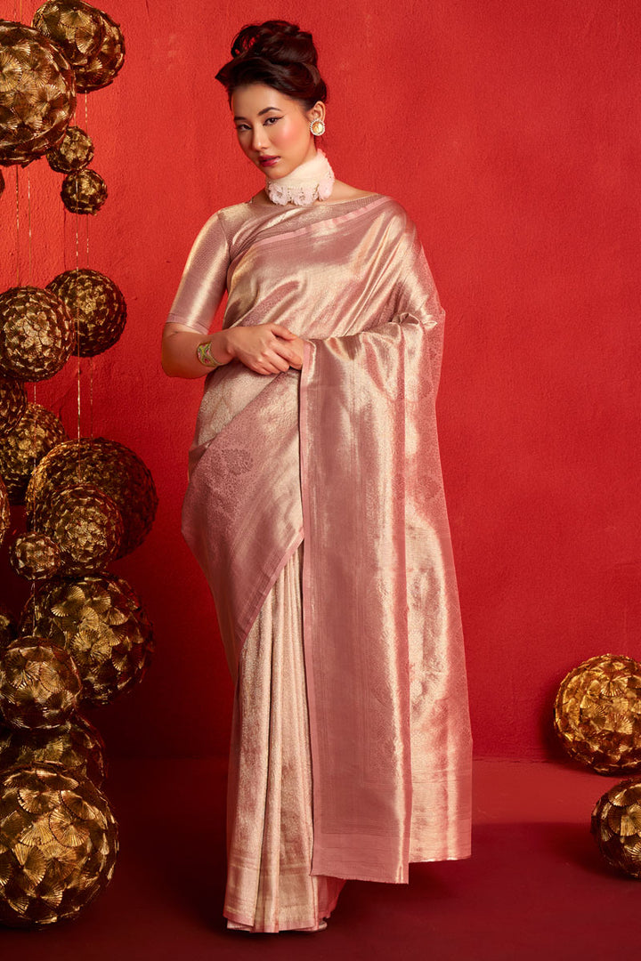 Weaving Work Kanjeepuram Tissue Silk Saree In Peach Color