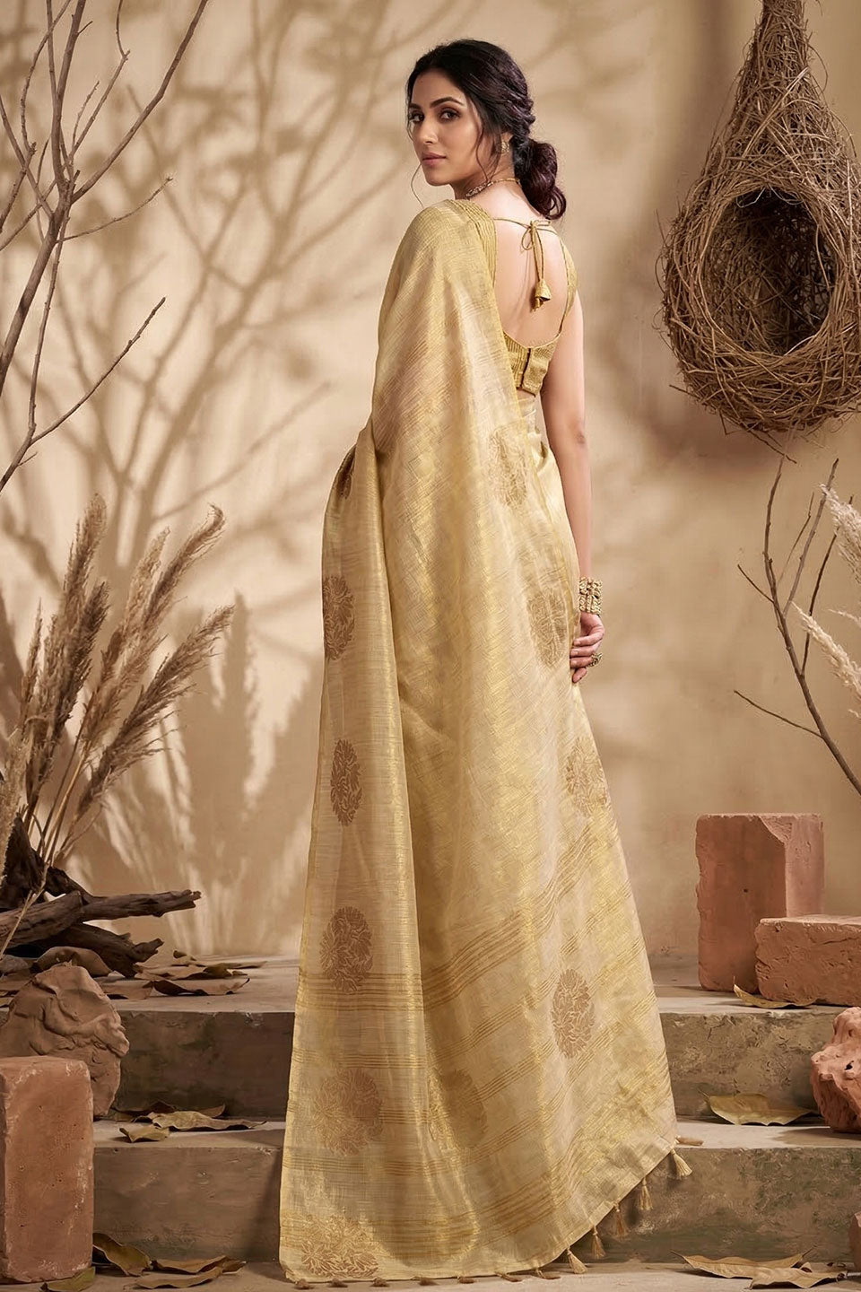 Festive Style Tissue Silk Weaving Work Saree In Cream Color