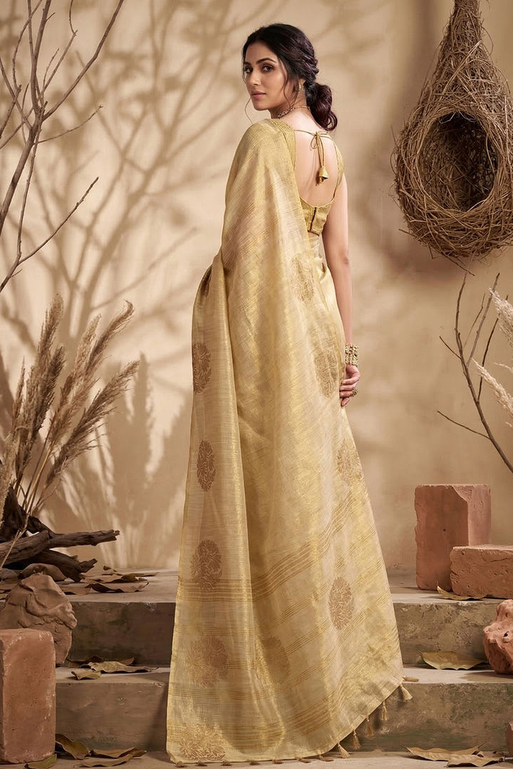 Festive Style Tissue Silk Weaving Work Saree In Cream Color