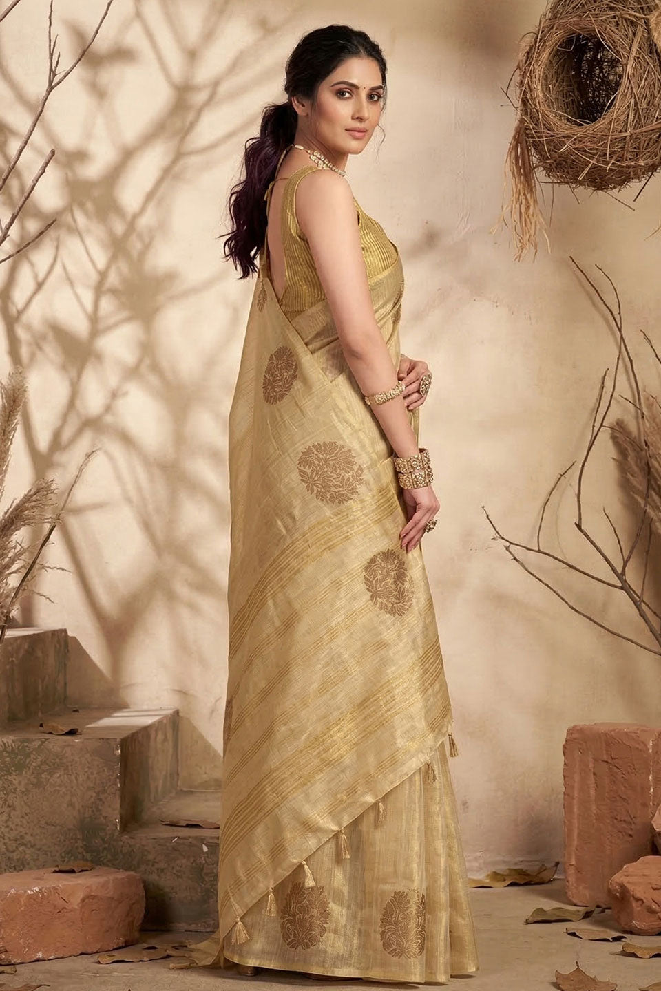 Festive Style Tissue Silk Weaving Work Saree In Cream Color