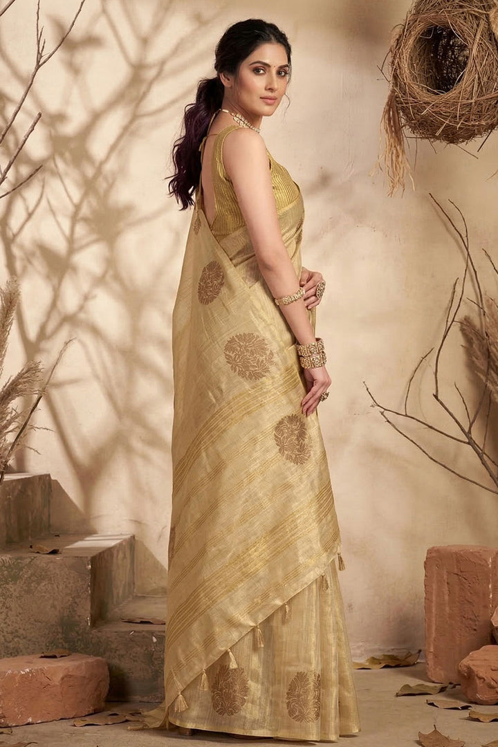Festive Style Tissue Silk Weaving Work Saree In Cream Color