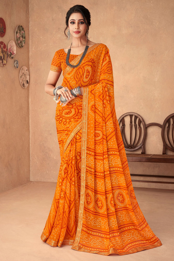 Bandhani Printed Attached Banarasi Border Orange Color Chiffon Saree | Buy Online India