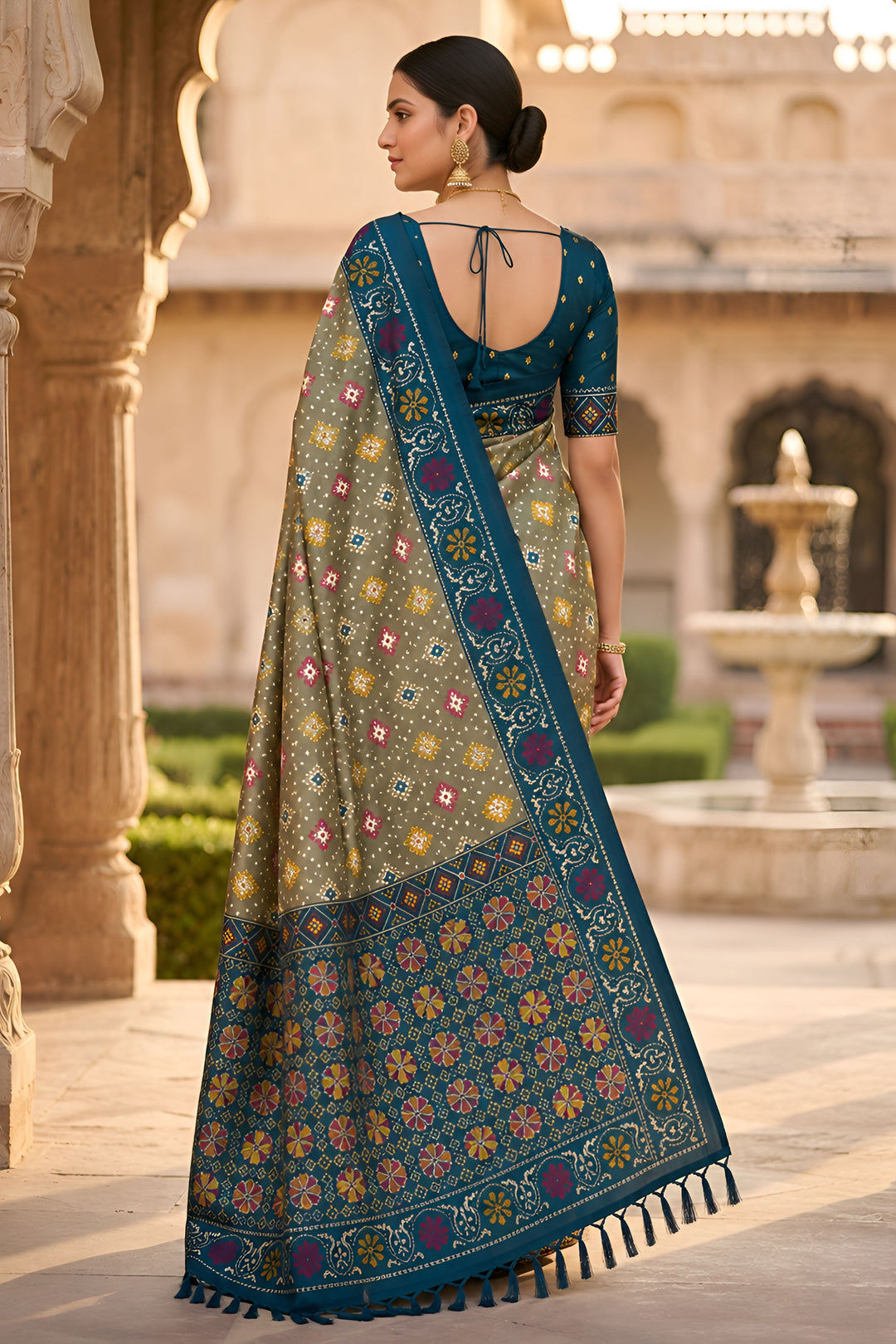 Festive Style Soothing Patola Printed Silk Saree In Green Color