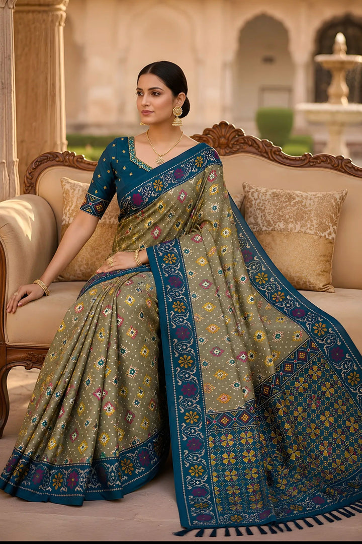 Festive Style Soothing Patola Printed Silk Saree In Green Color