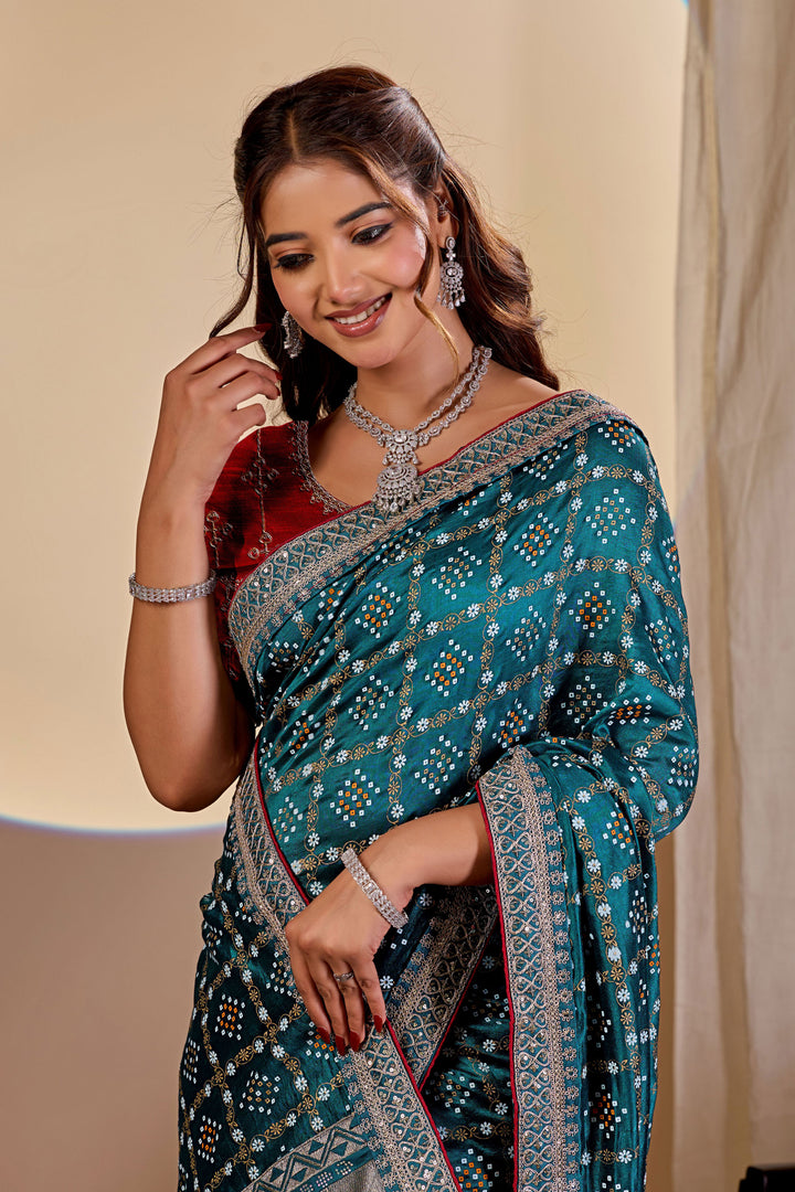 Attractive Bandhani Style Printed Saree In Teal Color