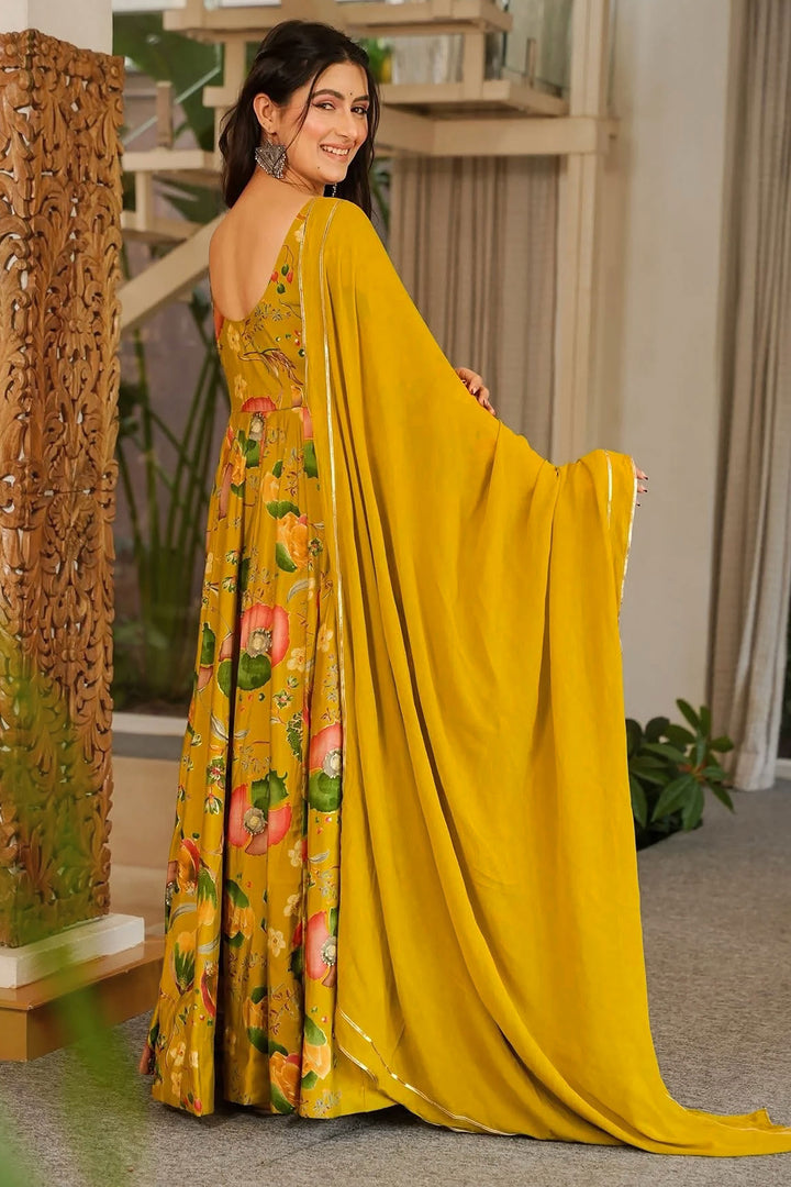 Mustard Color Attractive Readymade Royon Gown With Dupatta