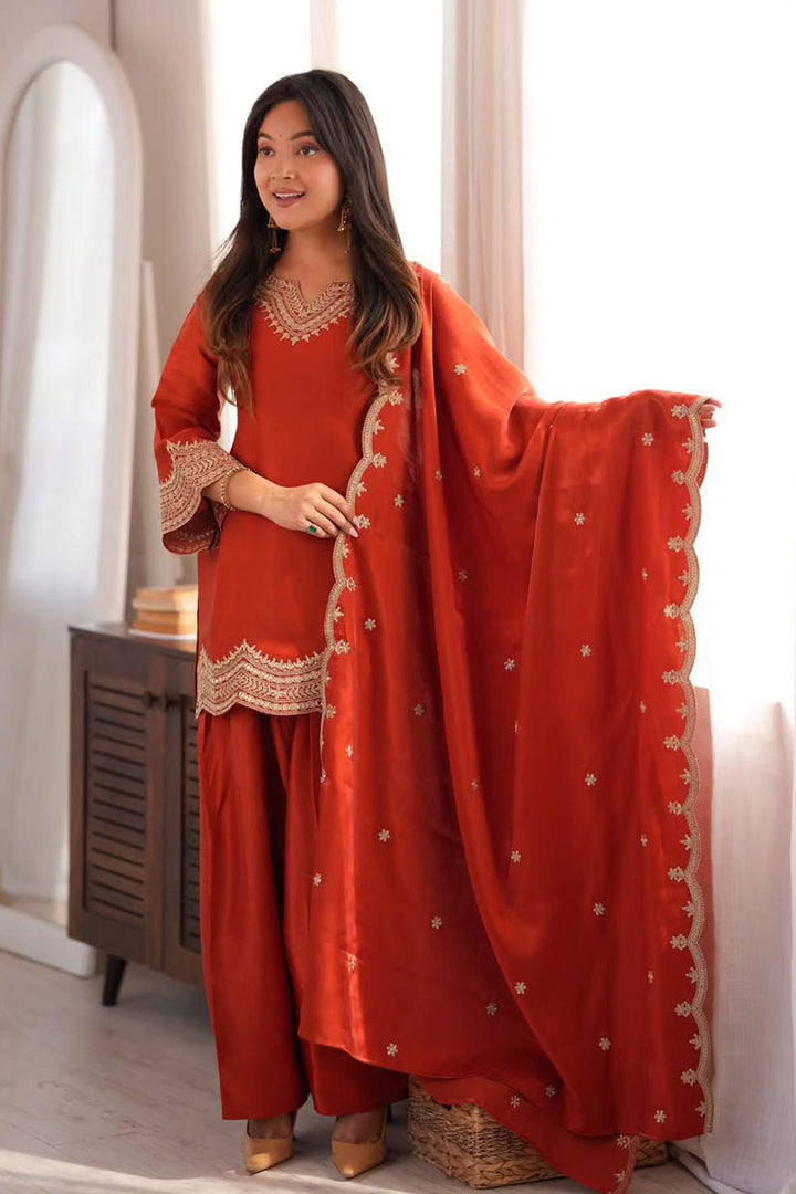 Sober Orange Fancy Fabric Salwar Suit For Festive